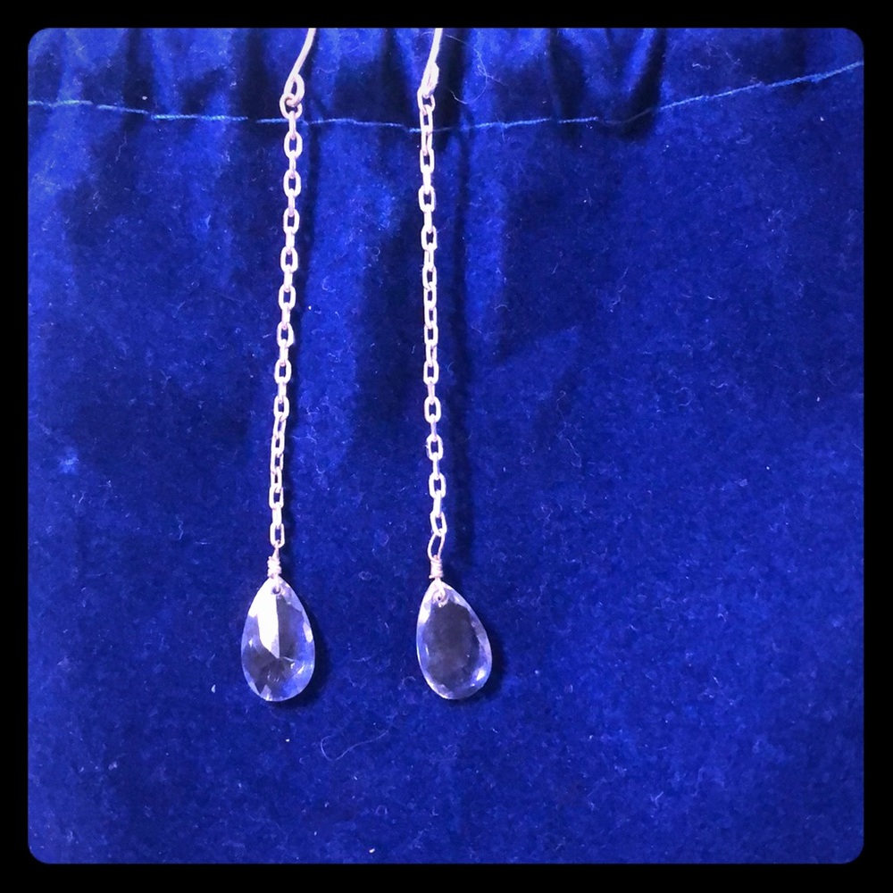 Long crystal drop earring.